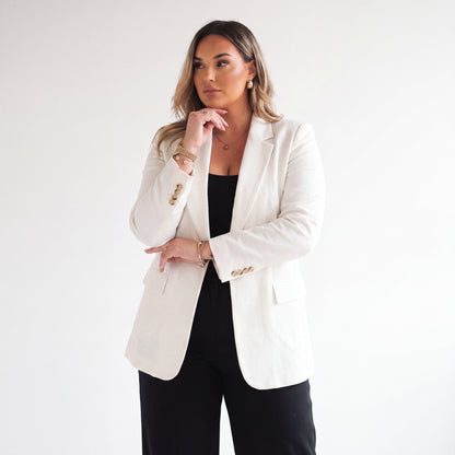 Blazer ejecutiva elegante con botón Carey