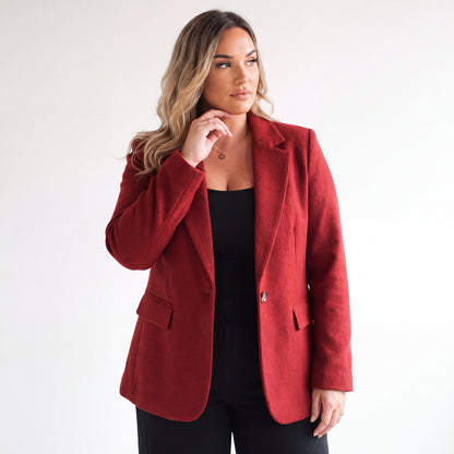 Blazer ejecutiva elegante con botón Carey